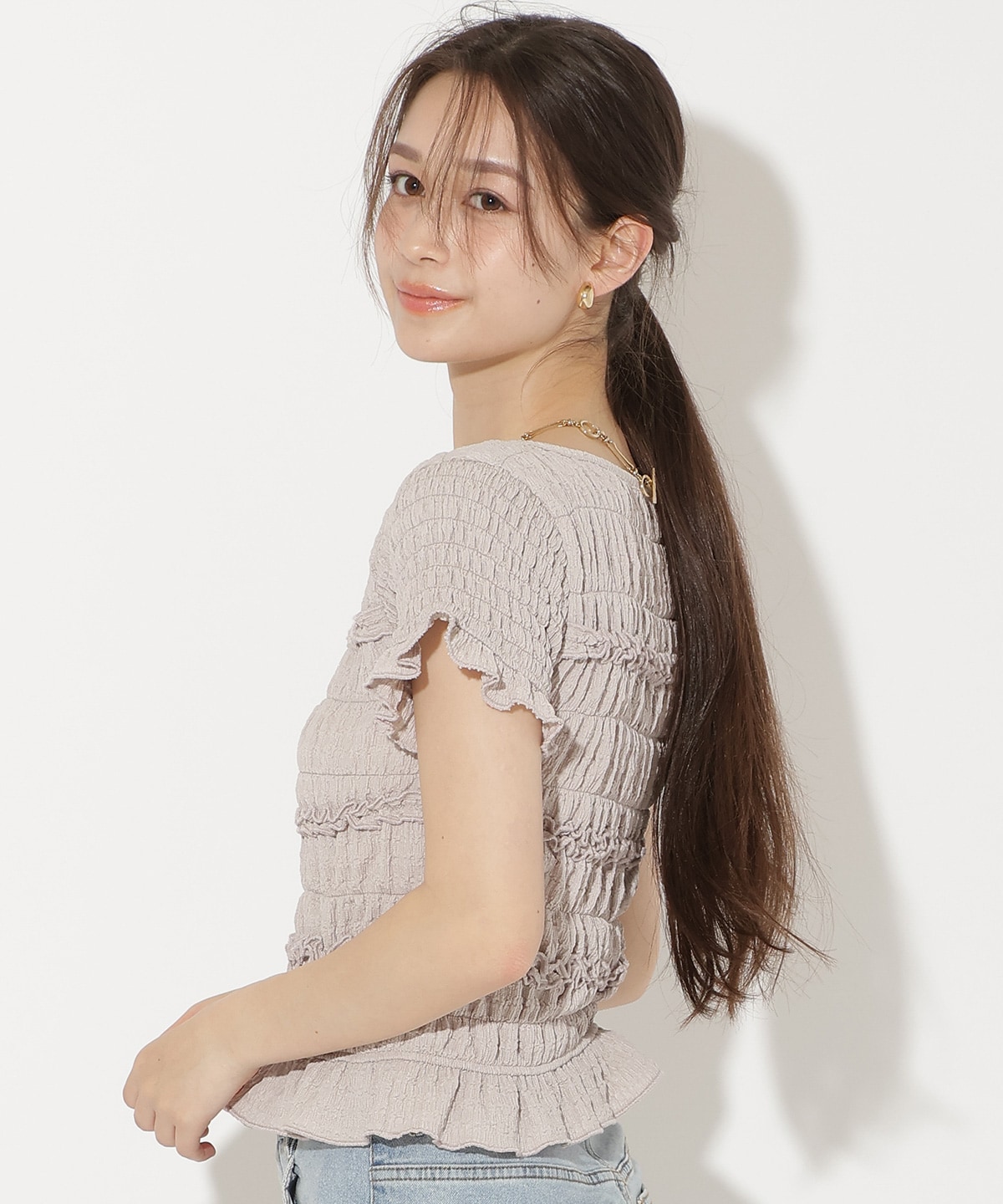 シャーリングフリルトップス