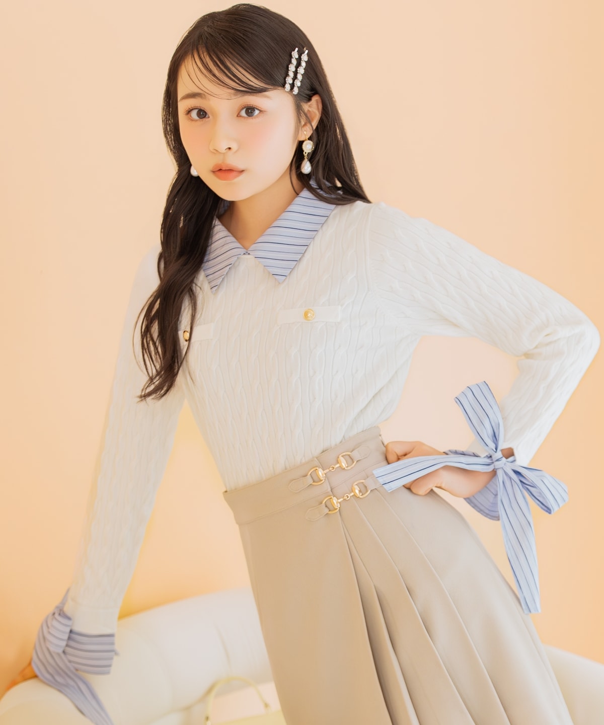 リボンカフスドッキングケーブルニット