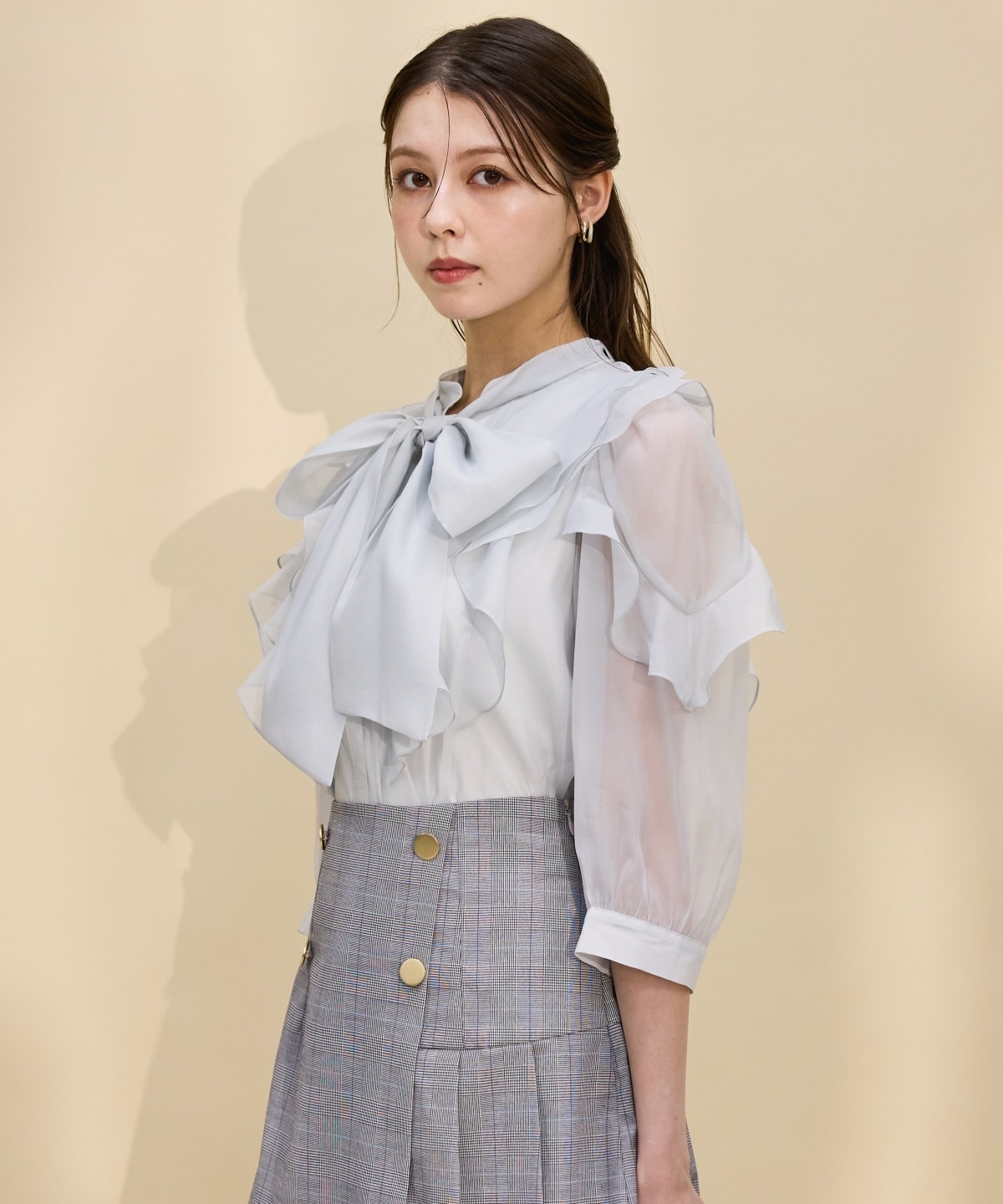 シアービッグリボンフリルブラウス