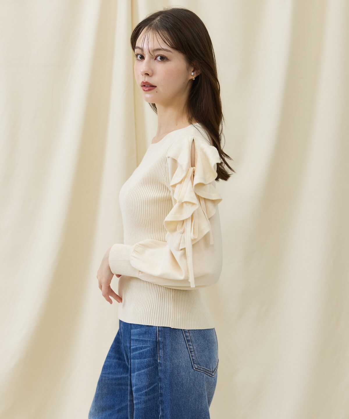 袖フリルニット