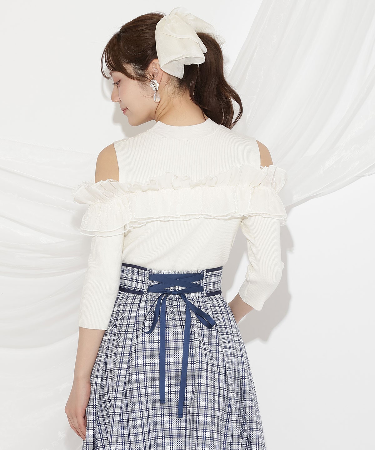 フリルドッキングリブニット