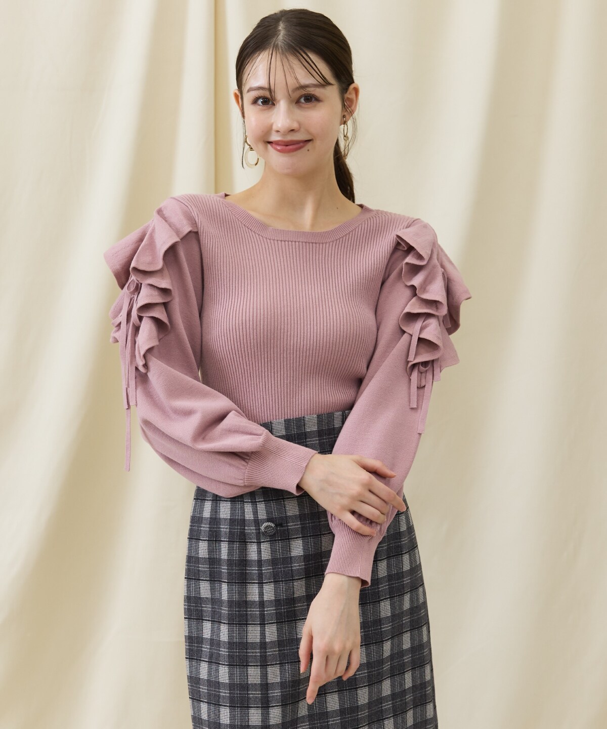 袖フリルニット