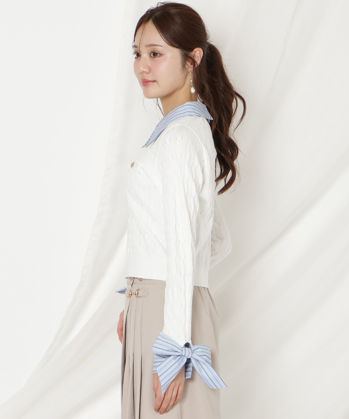 リボンカフスドッキングケーブルニット