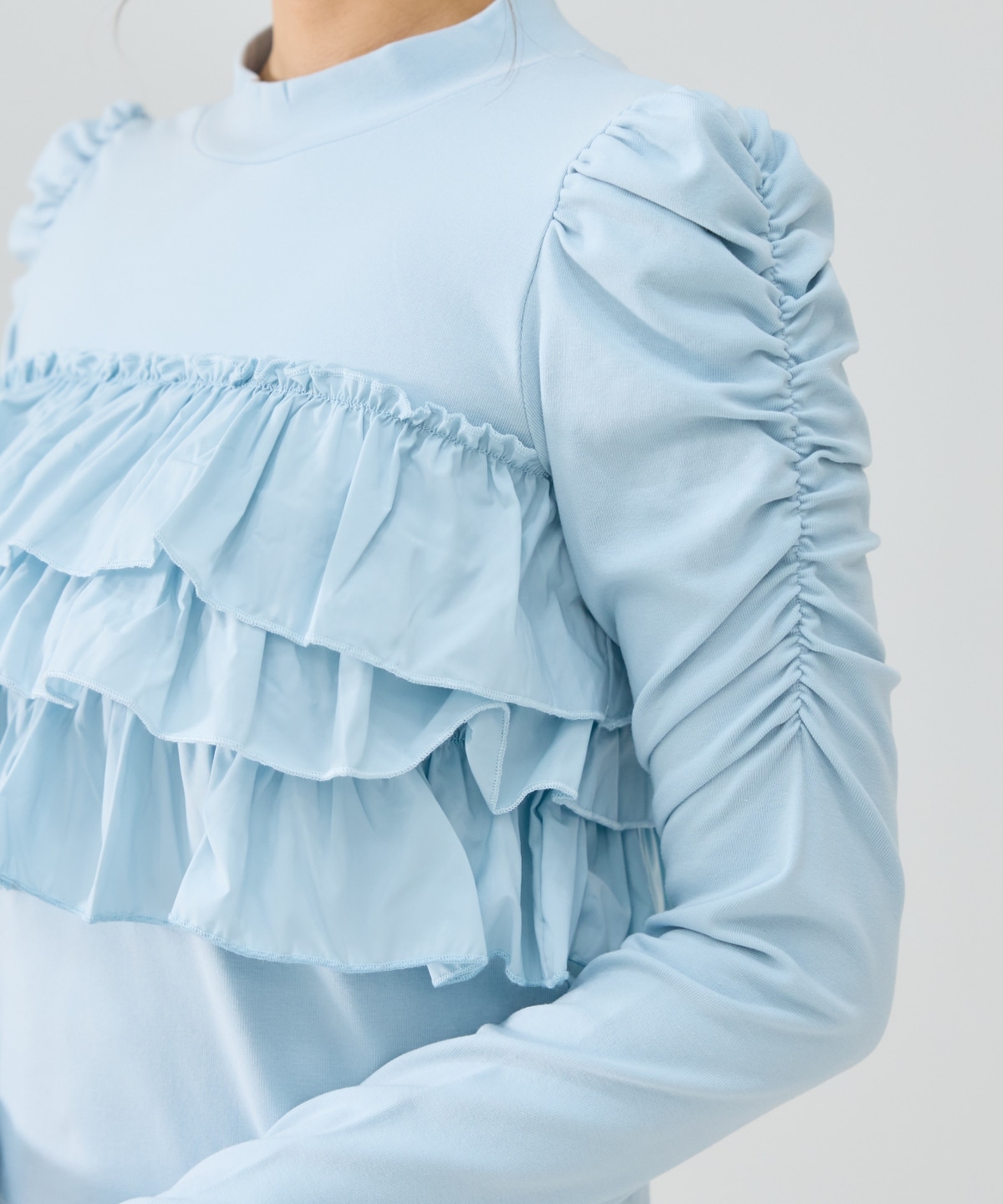 異素材フリルトップス