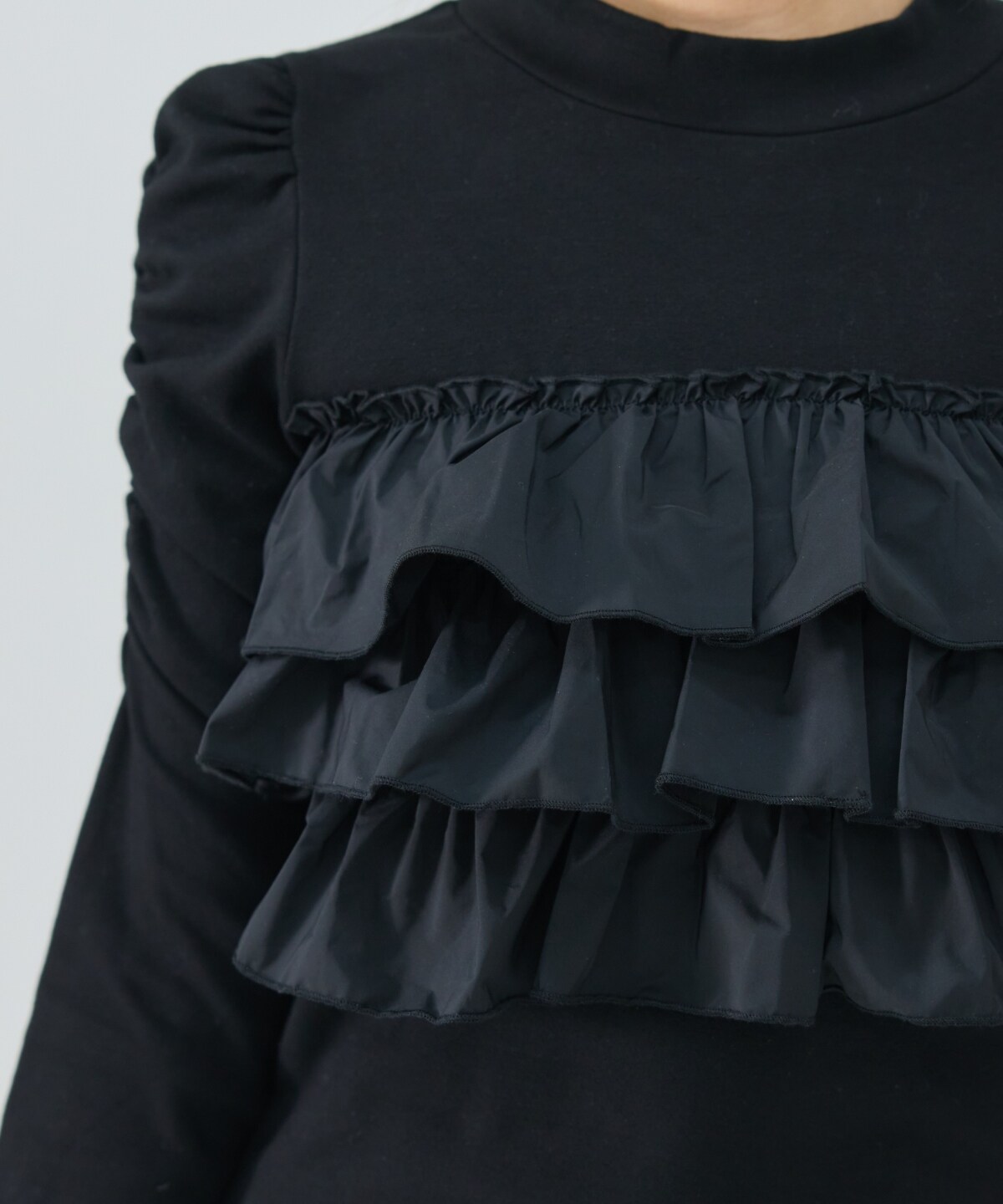 異素材フリルトップス