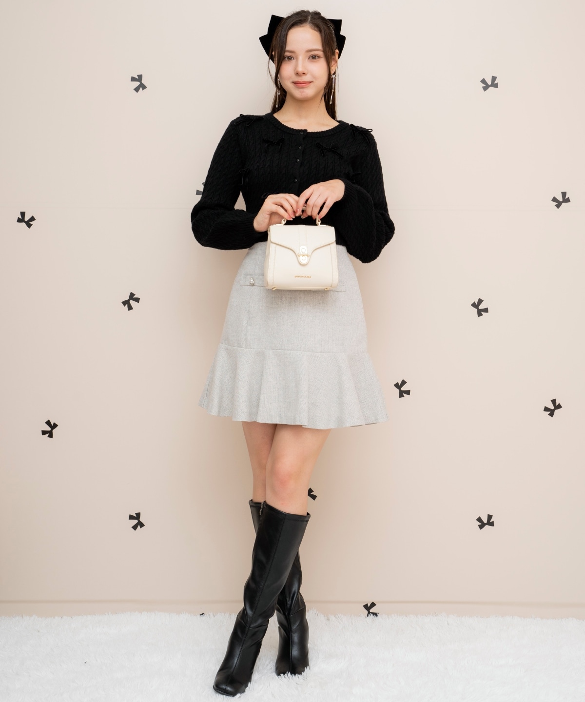 メニーリボンケーブルカーディガン