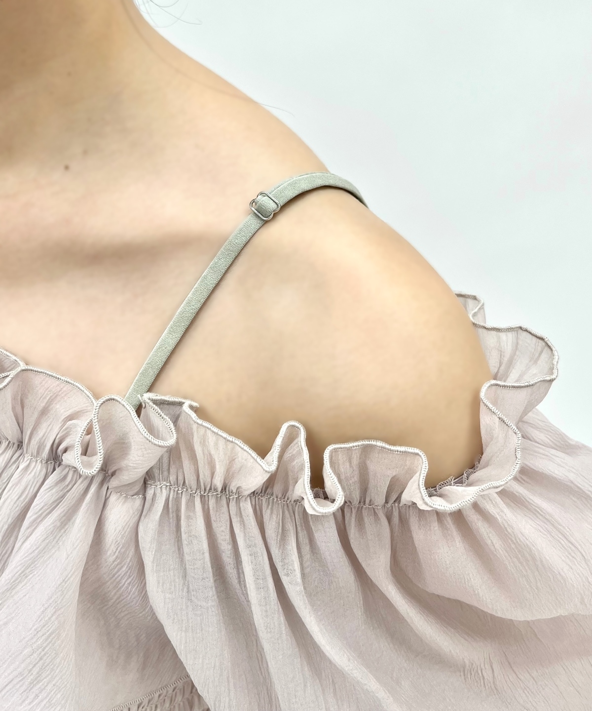 シャーリングペプラムブラウス