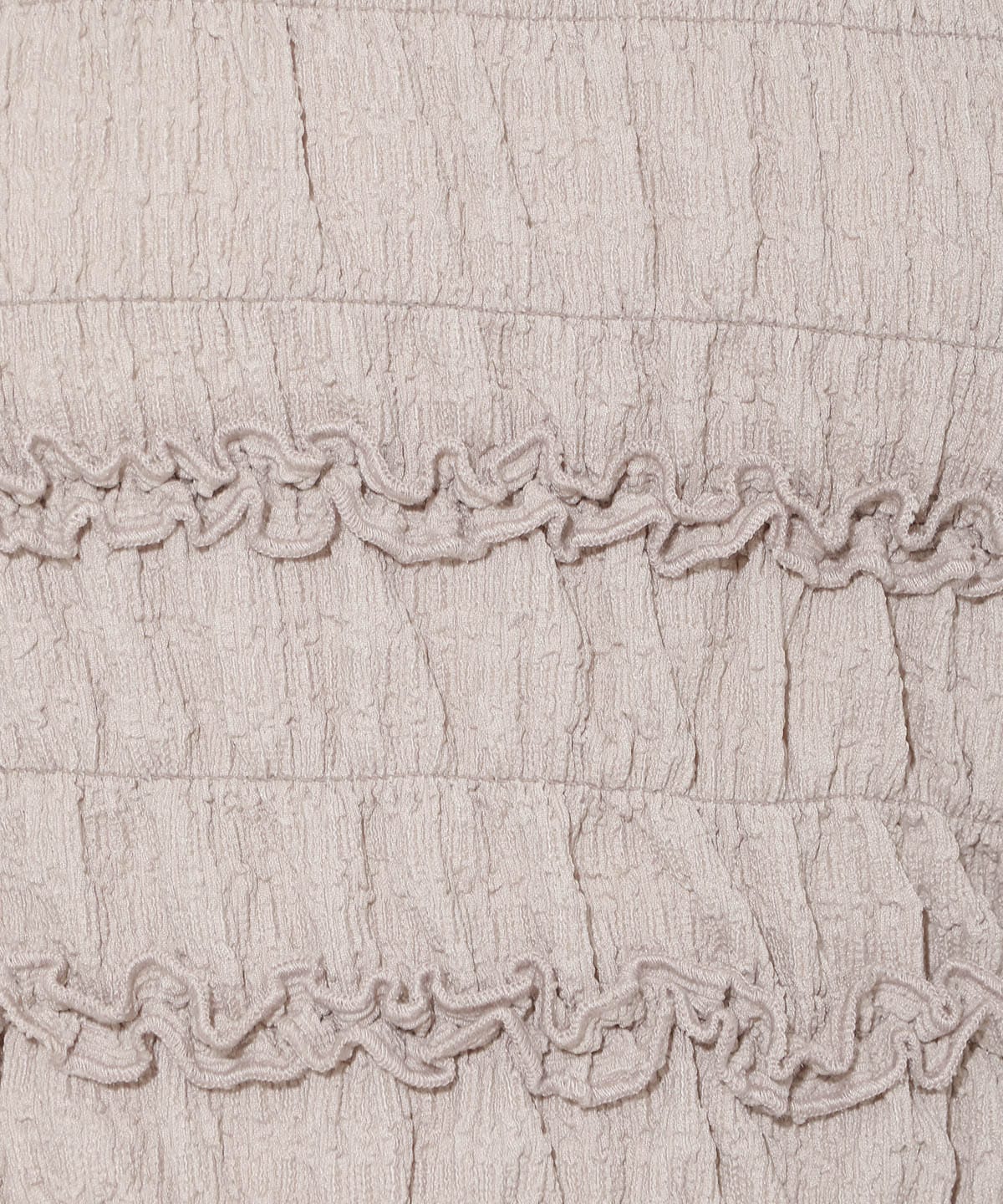 シャーリングフリルトップス