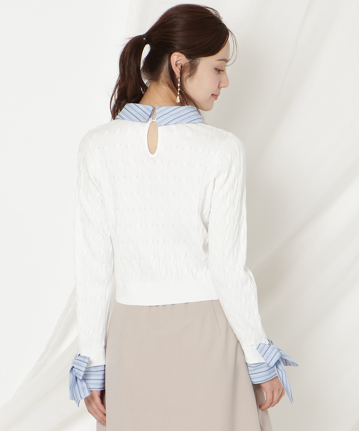 リボンカフスドッキングケーブルニット