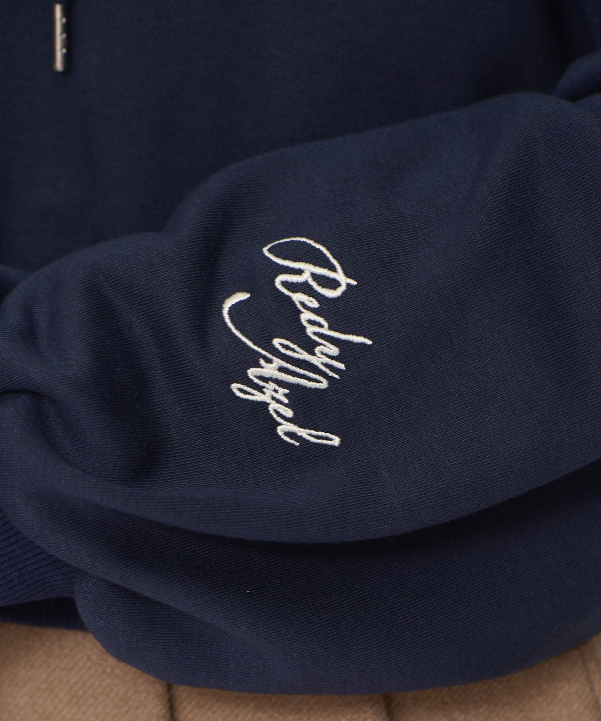 ［FILA×REDYAZEL］サガラロゴコンパクトフーディ