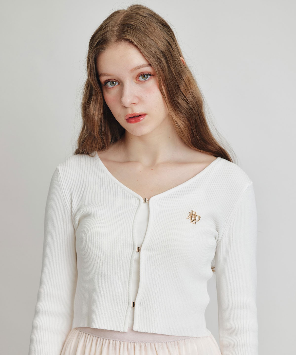 ロゴプレートリブニットカーディガン