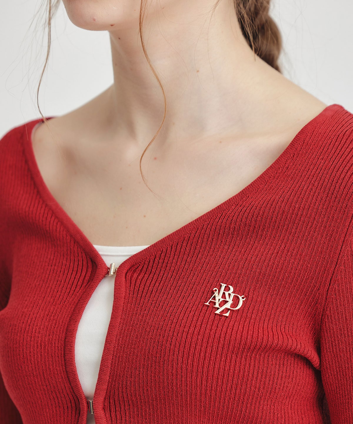 ロゴプレートリブニットカーディガン