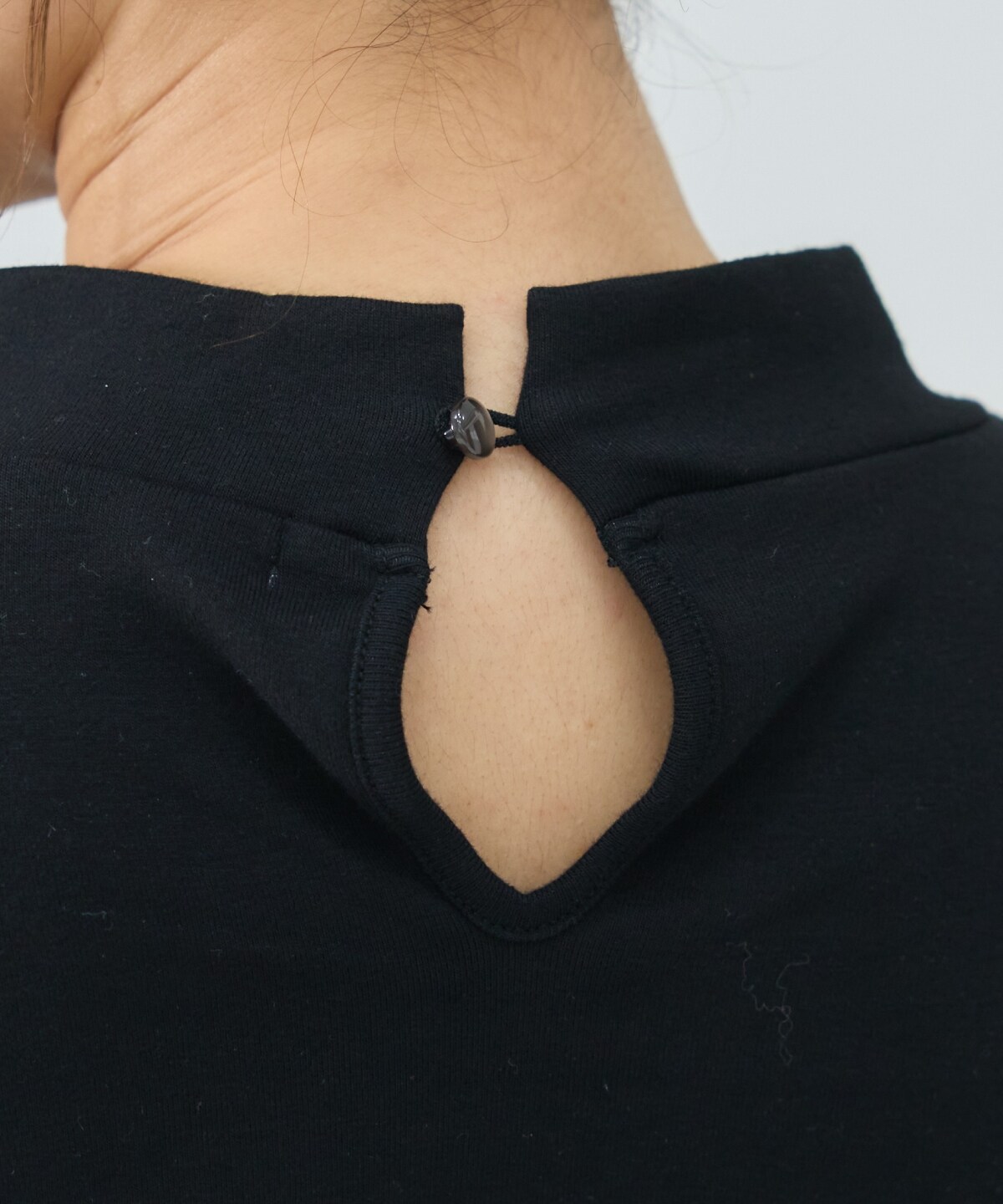 異素材フリルトップス