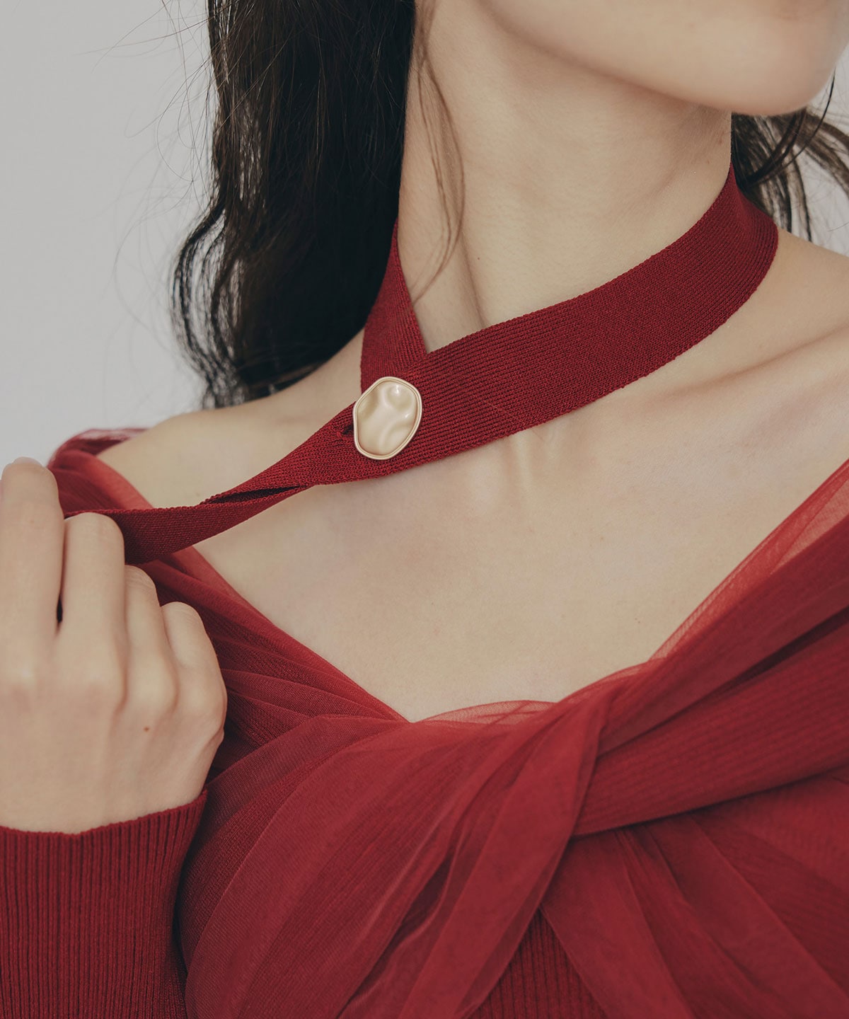 チョーカークロスチュールニットトップス