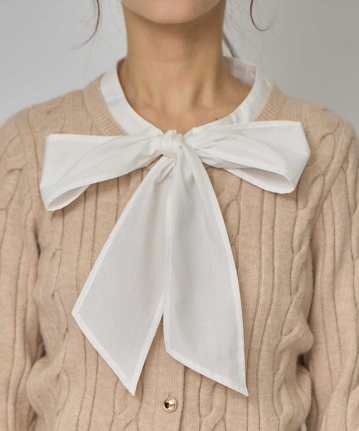 ボウタイケーブルニットプルオーバー