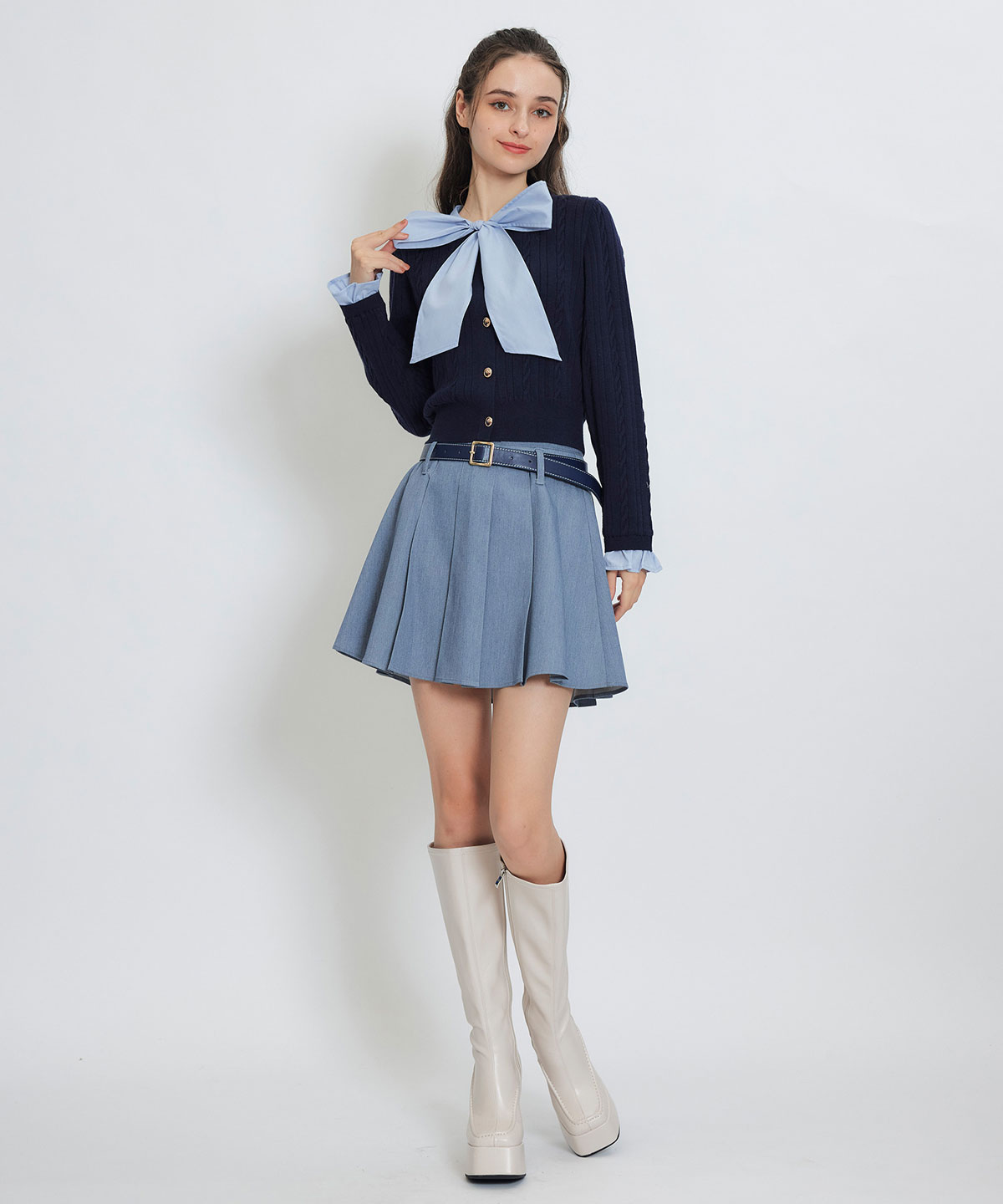 エンブレムボタンケーブルリボンタイニットトップス