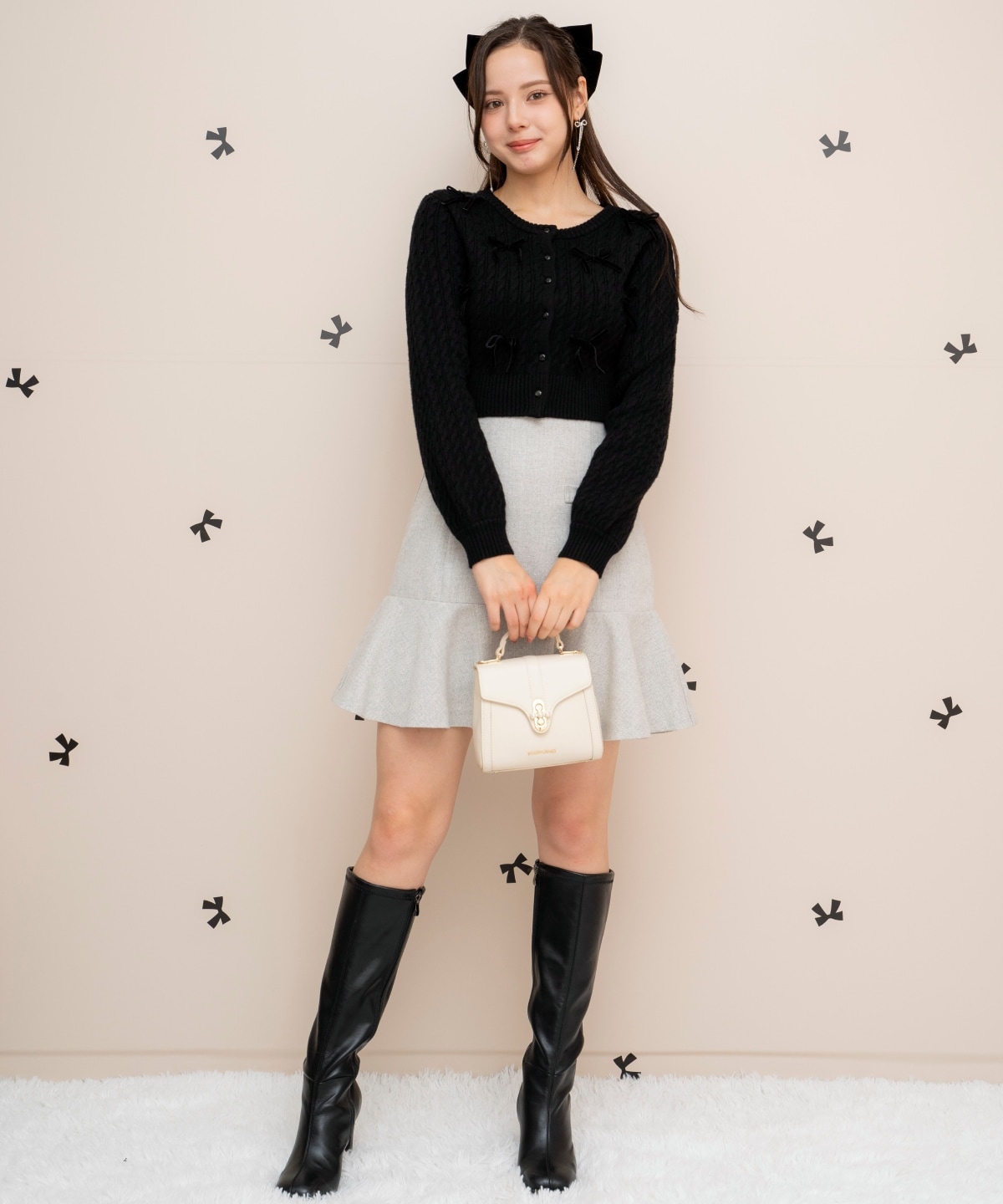 メニーリボンケーブルカーディガン