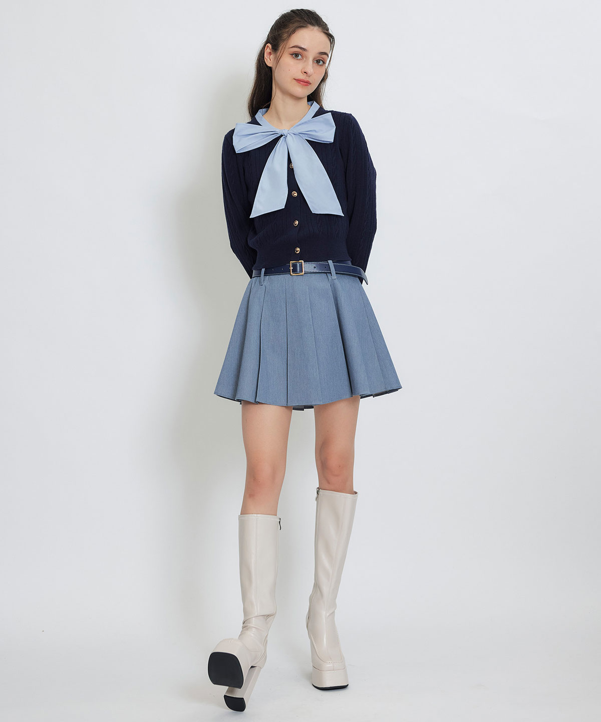 エンブレムボタンケーブルリボンタイニットトップス