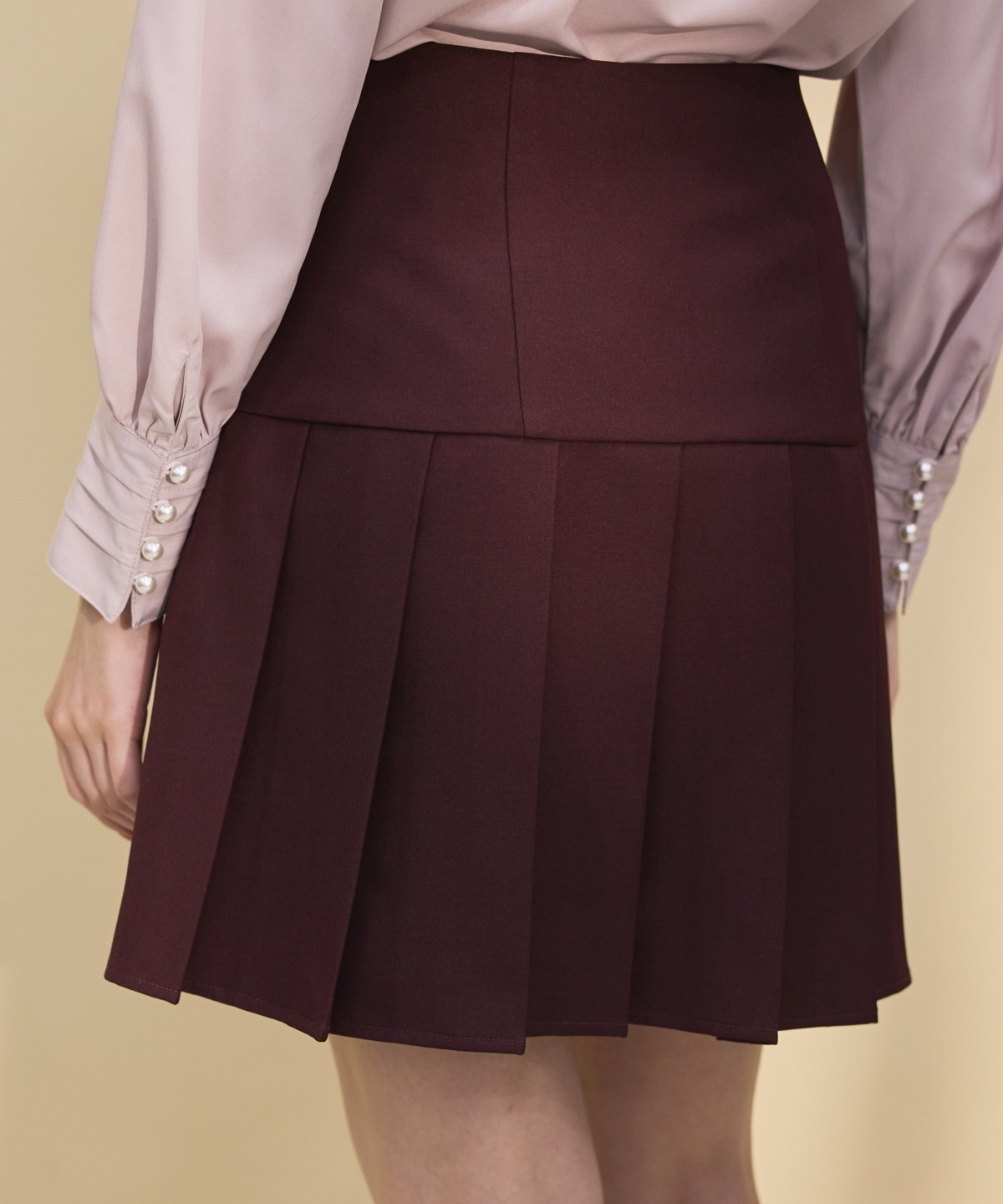 金ボタンアシメプリーツスカート