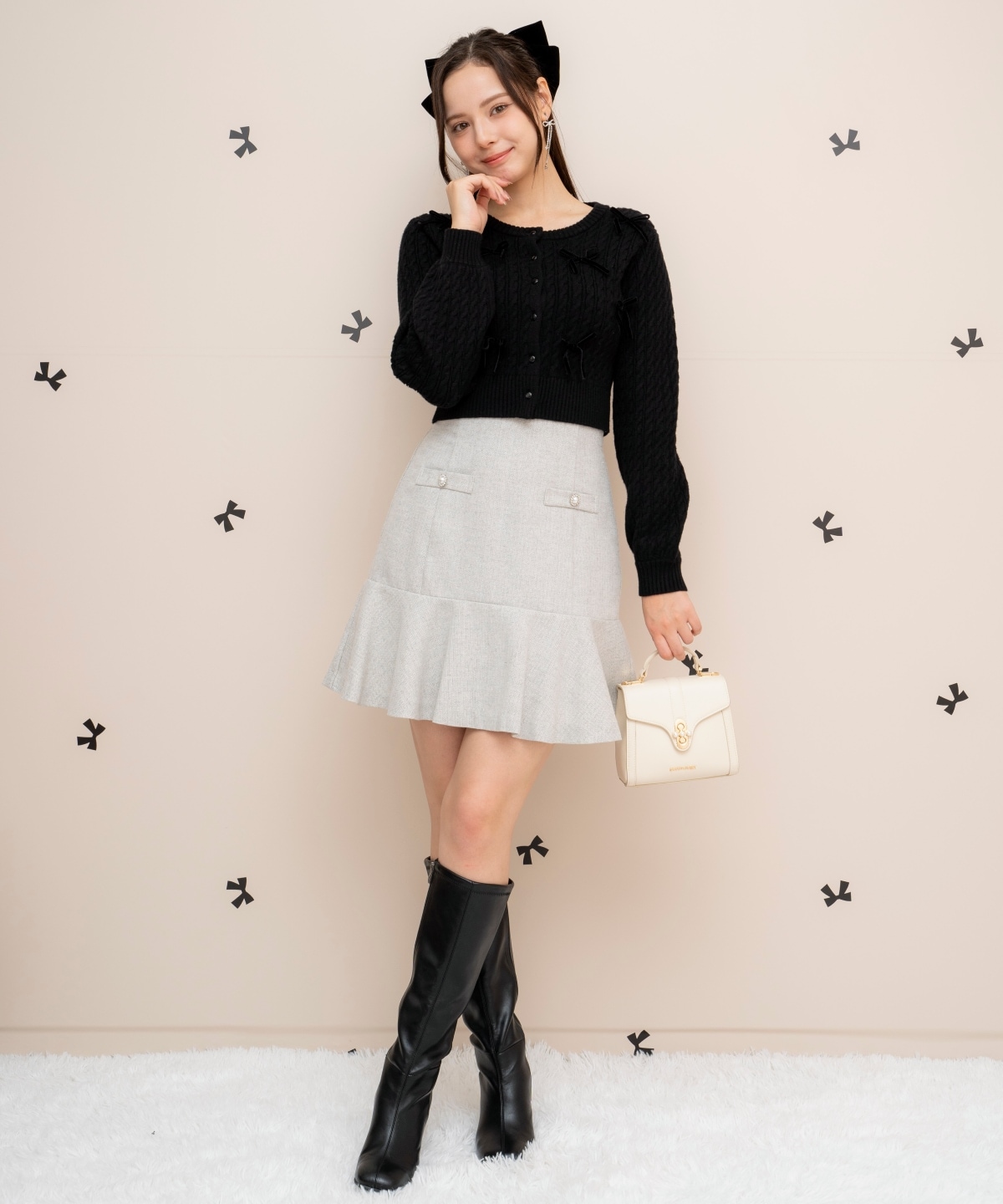 メニーリボンケーブルカーディガン