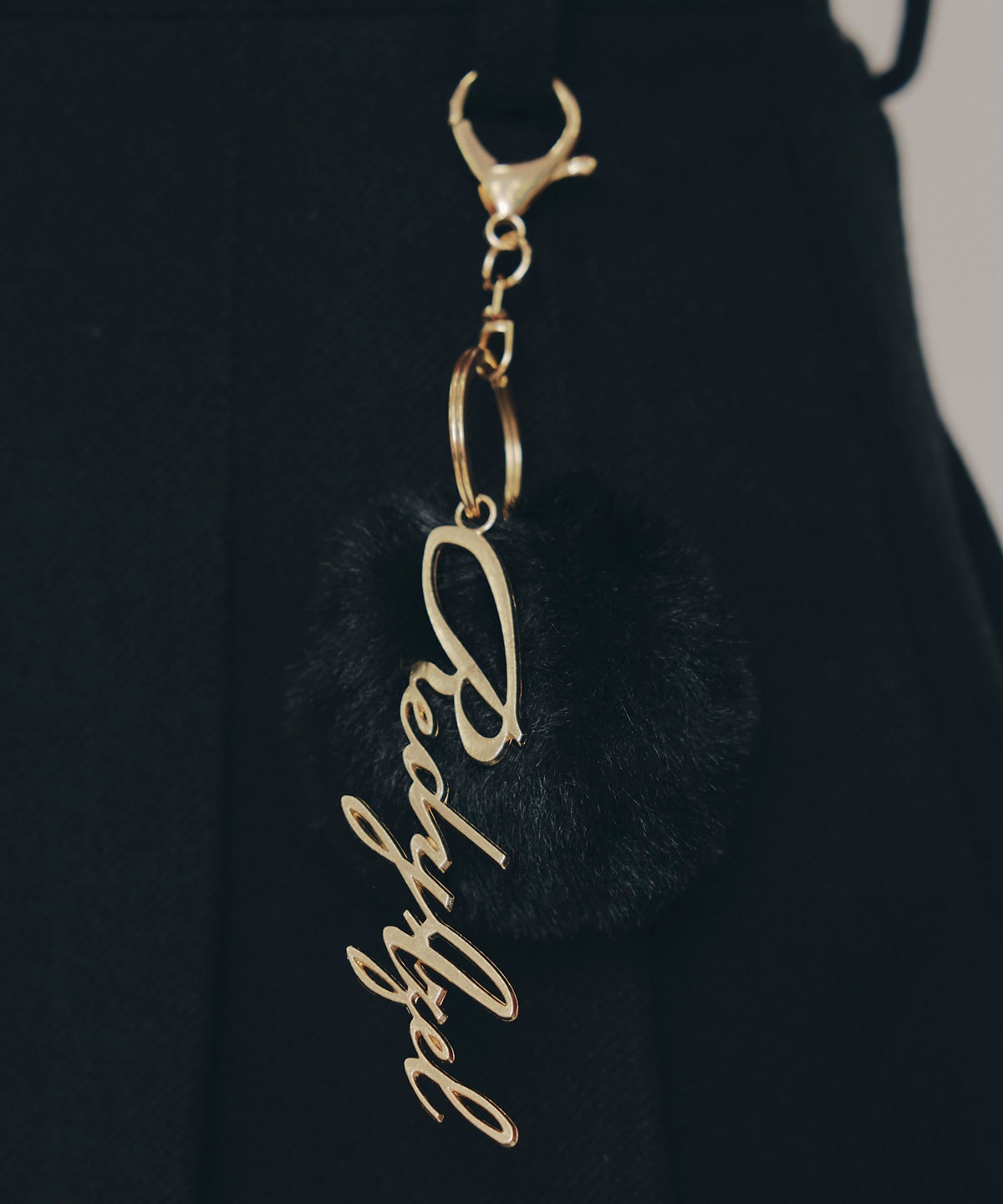 ファーチャームウールライクプリーツミニスカート