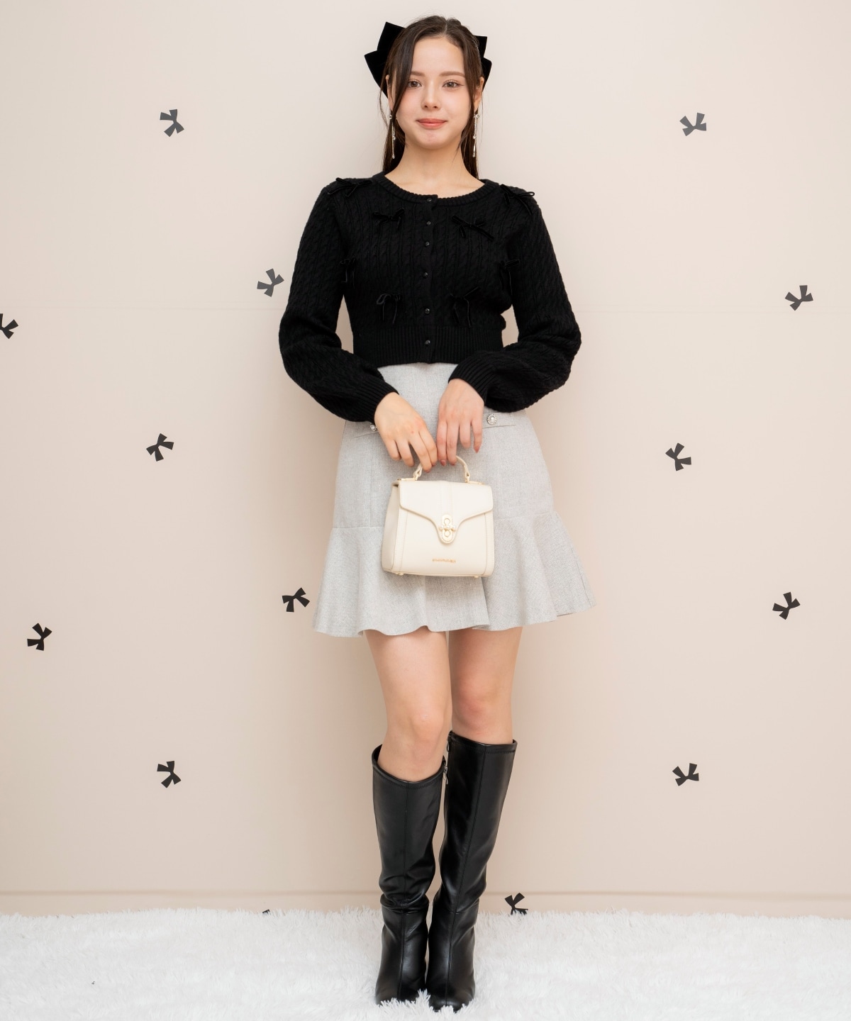 メニーリボンケーブルカーディガン