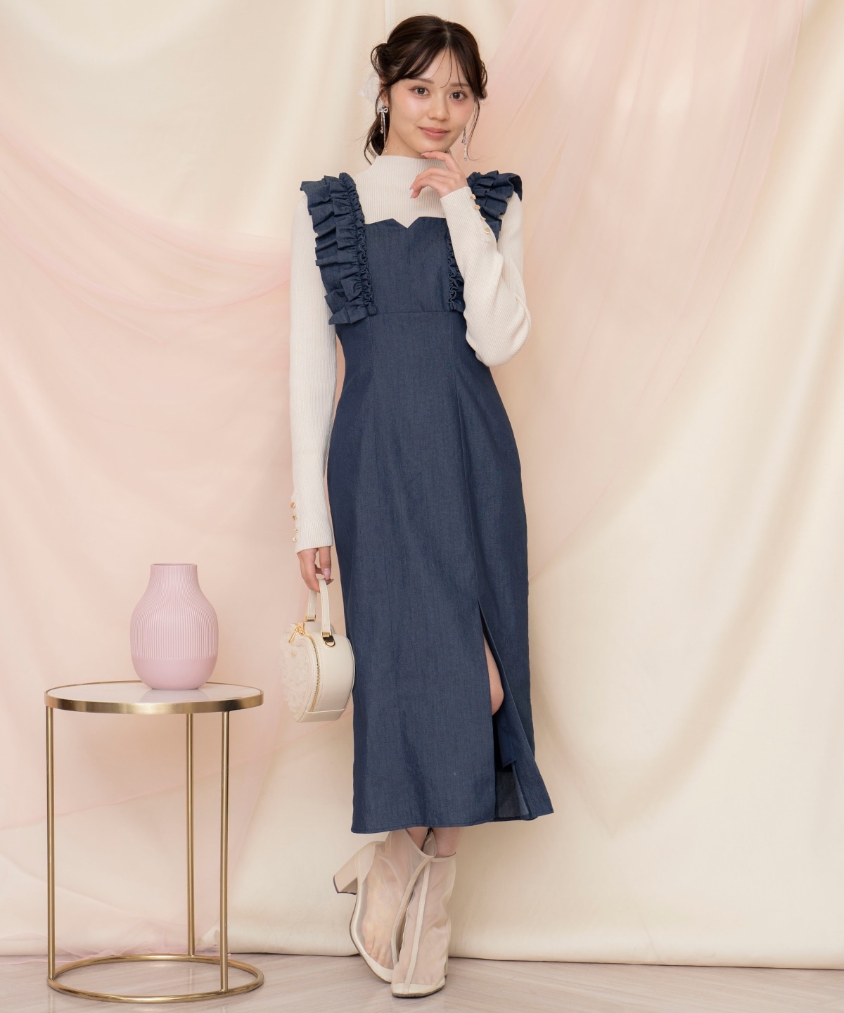 袖口ボタンボトルネックリブニット