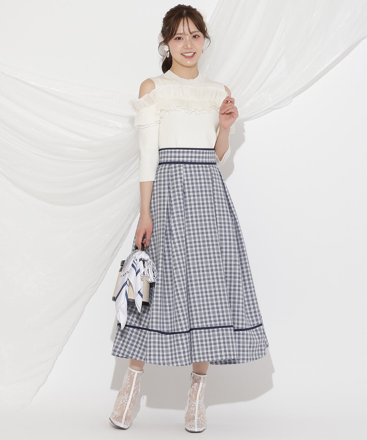 フリルドッキングリブニット