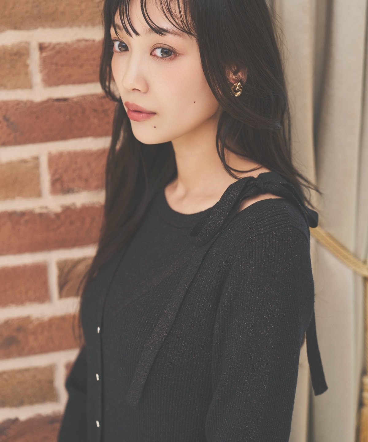 ホルタードッキングカーディガン風プルオーバー