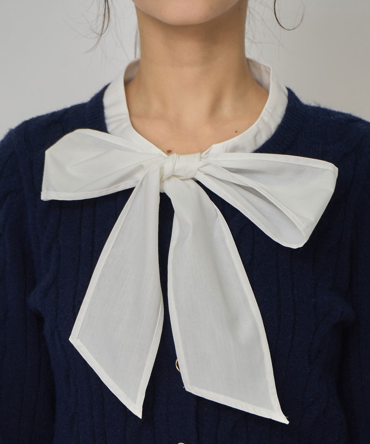 ボウタイケーブルニットプルオーバー