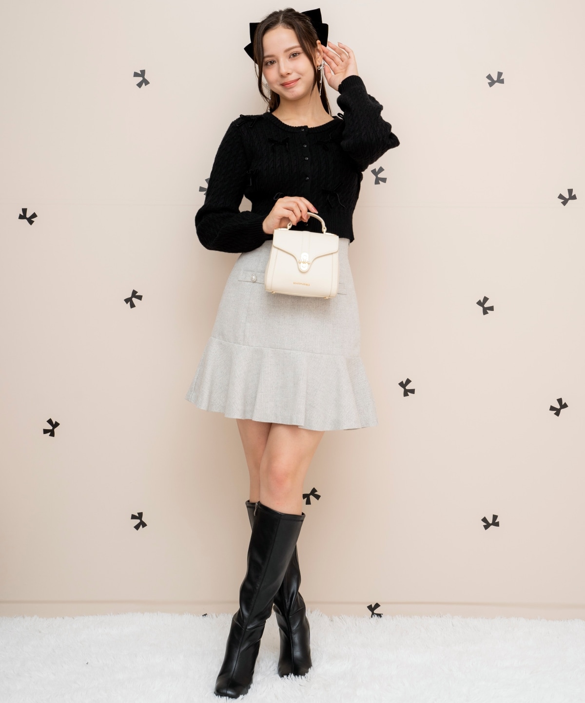 メニーリボンケーブルカーディガン