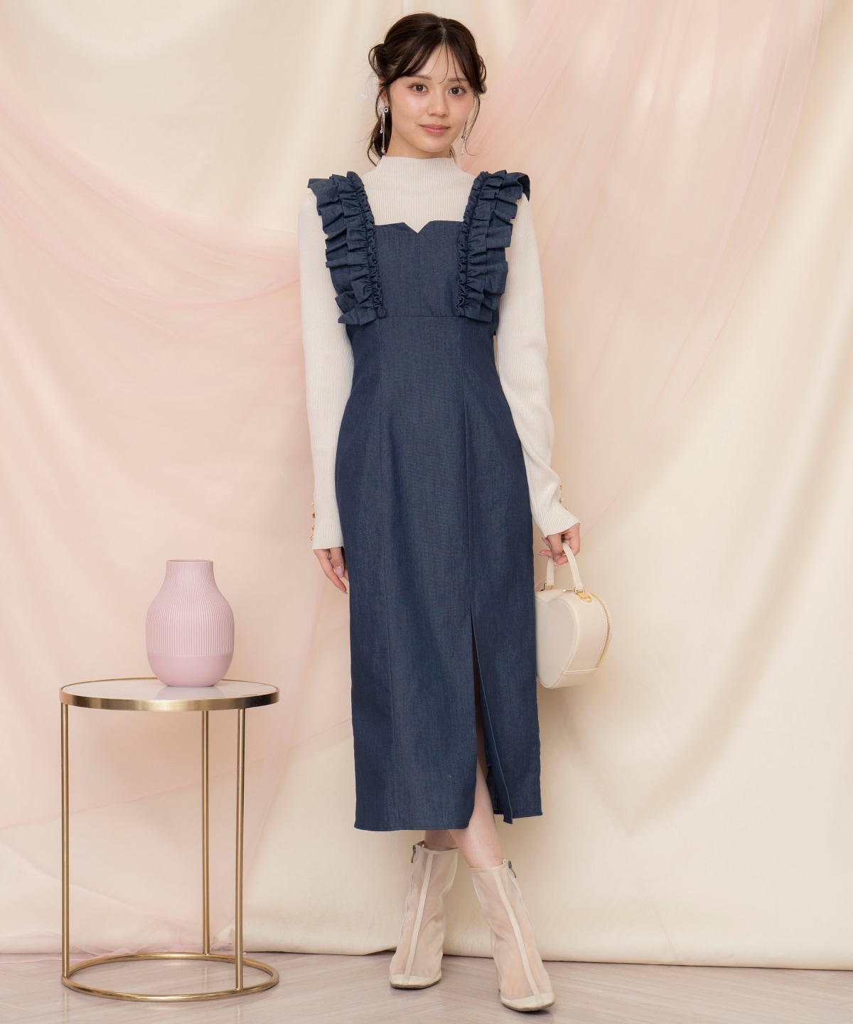 袖口ボタンボトルネックリブニット