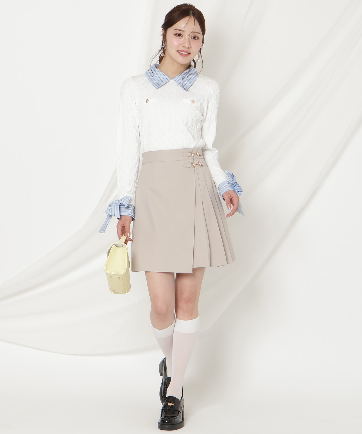 リボンカフスドッキングケーブルニット