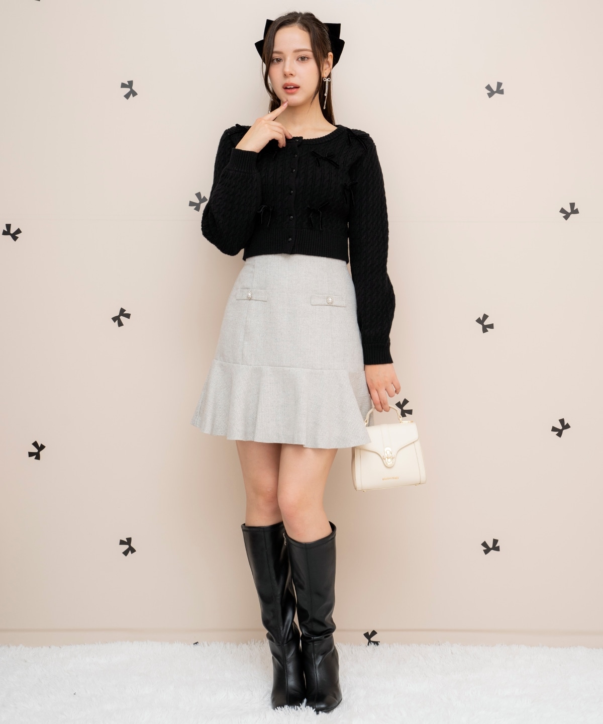 メニーリボンケーブルカーディガン