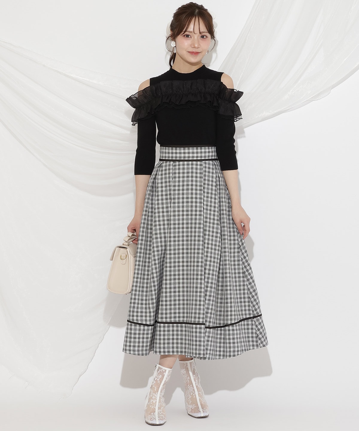 フリルドッキングリブニット