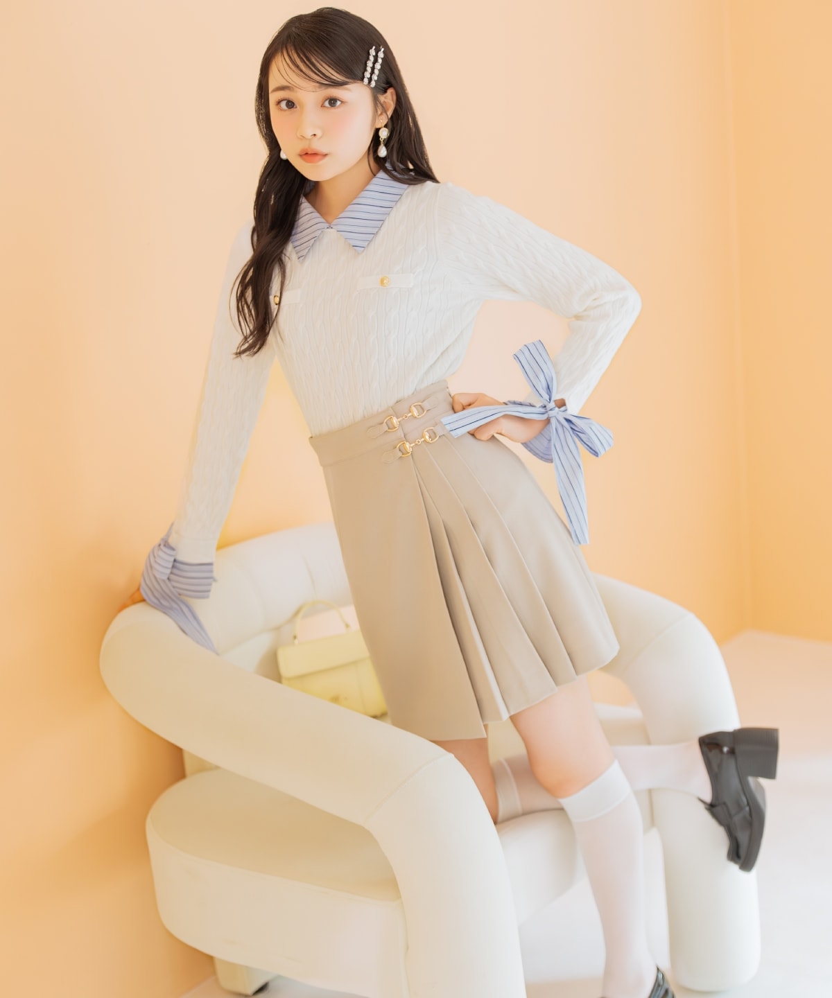 リボンカフスドッキングケーブルニット