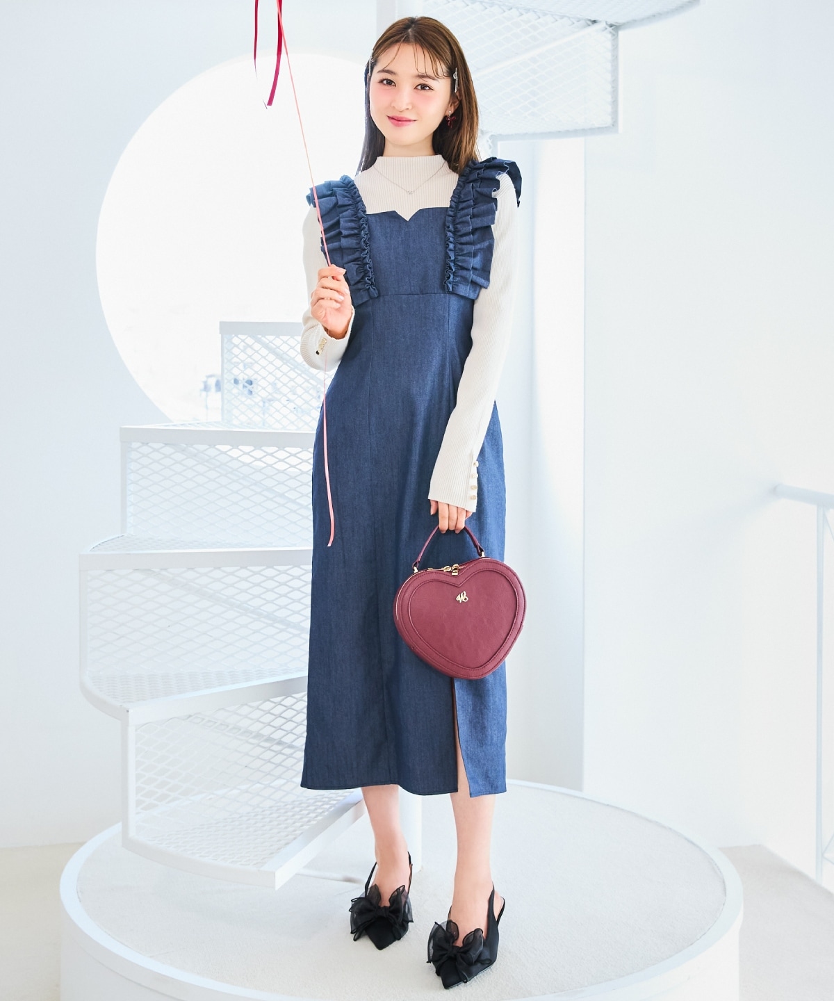 袖口ボタンボトルネックリブニット