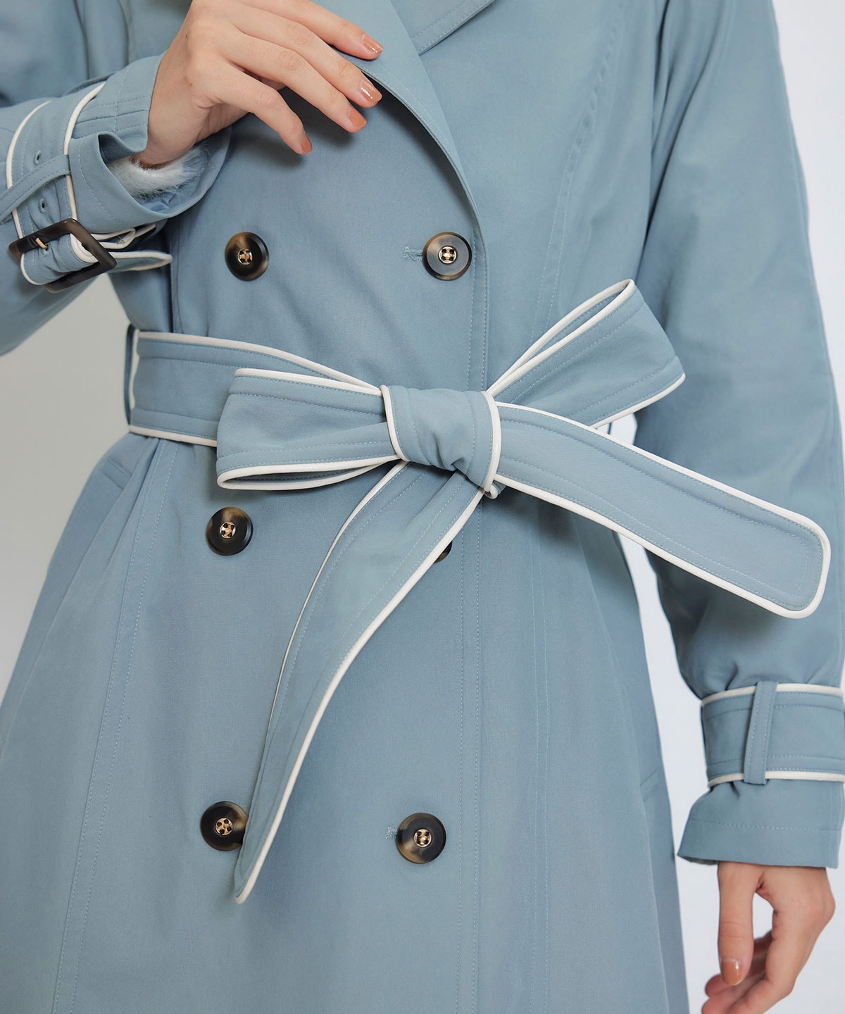 バックバイカラーパイピングベルトデザインロングトレンチコート