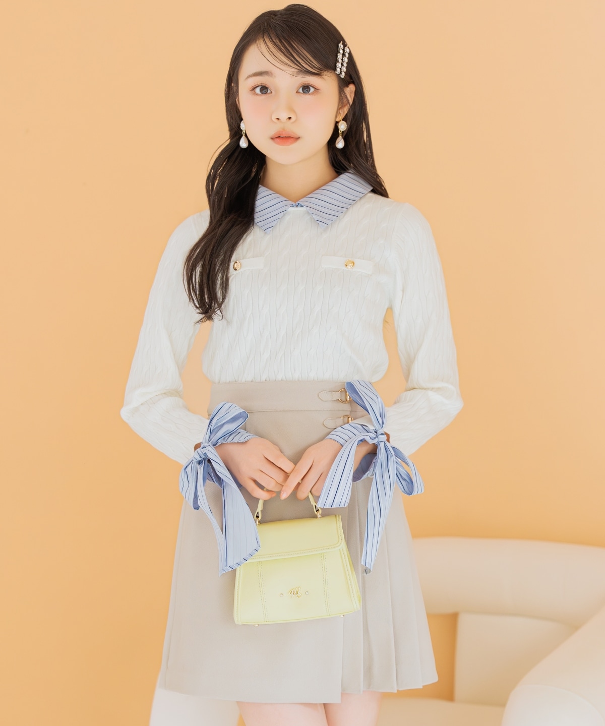 リボンカフスドッキングケーブルニット