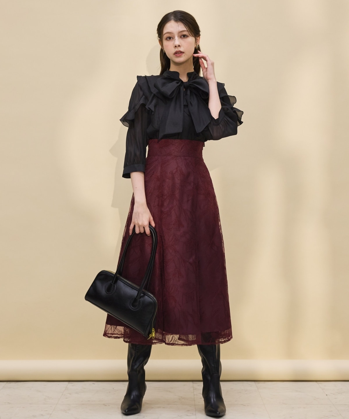 シアービッグリボンフリルブラウス