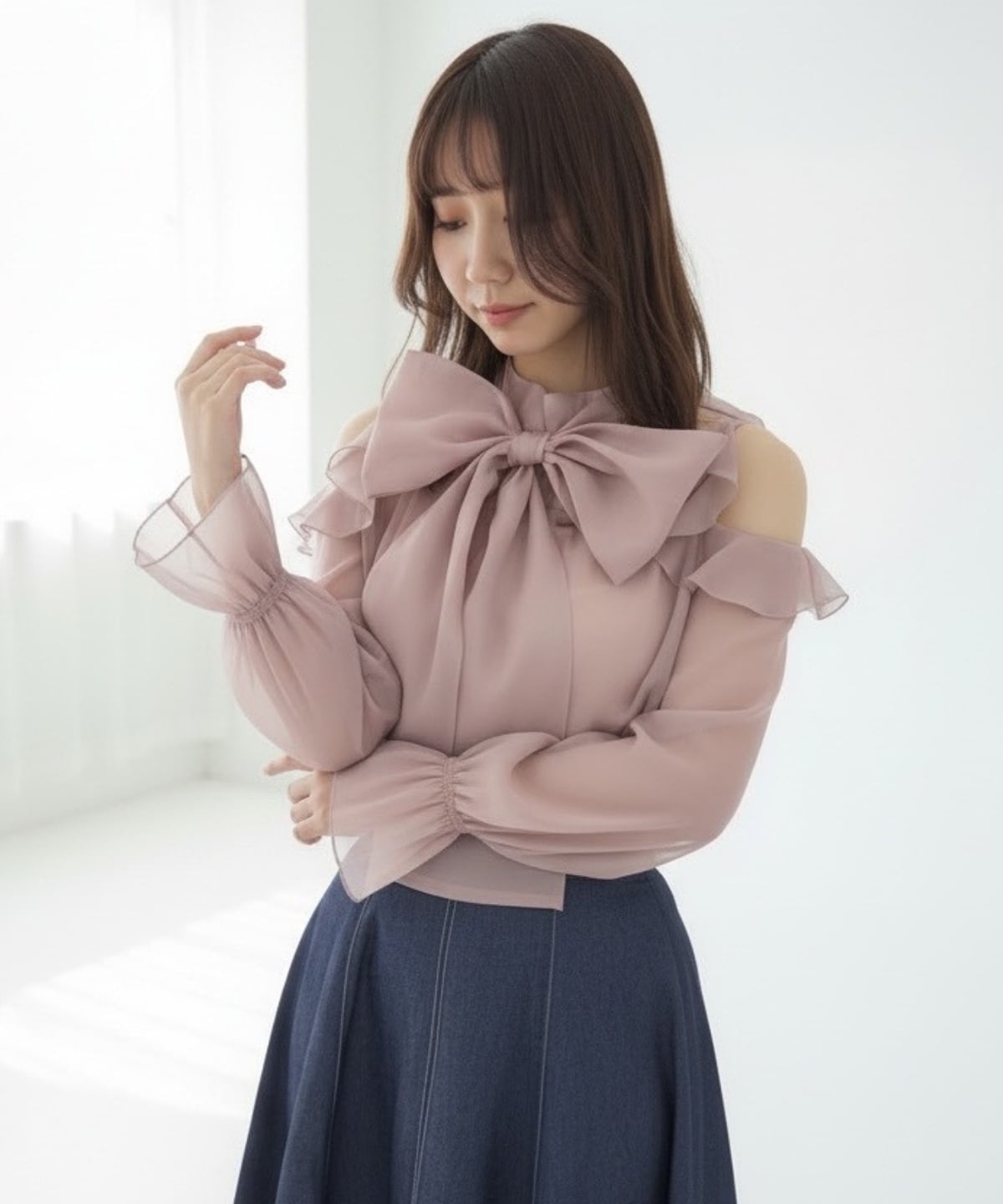 オフショルフリルシアーブラウス