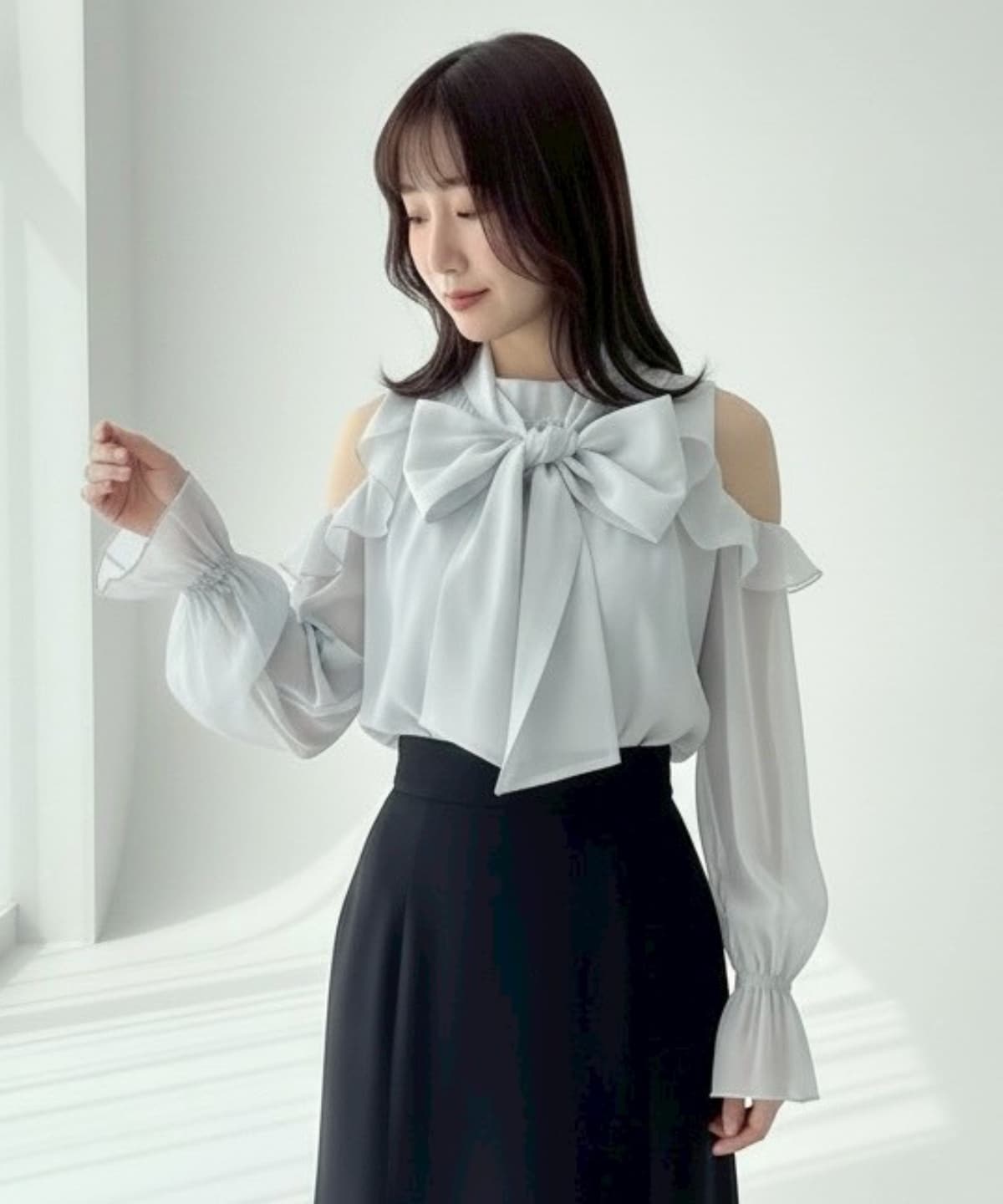 オフショルフリルシアーブラウス