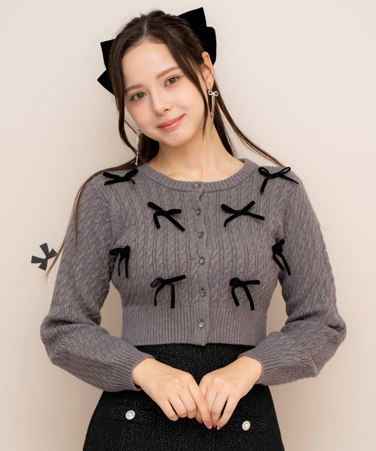 メニーリボンケーブルカーディガン