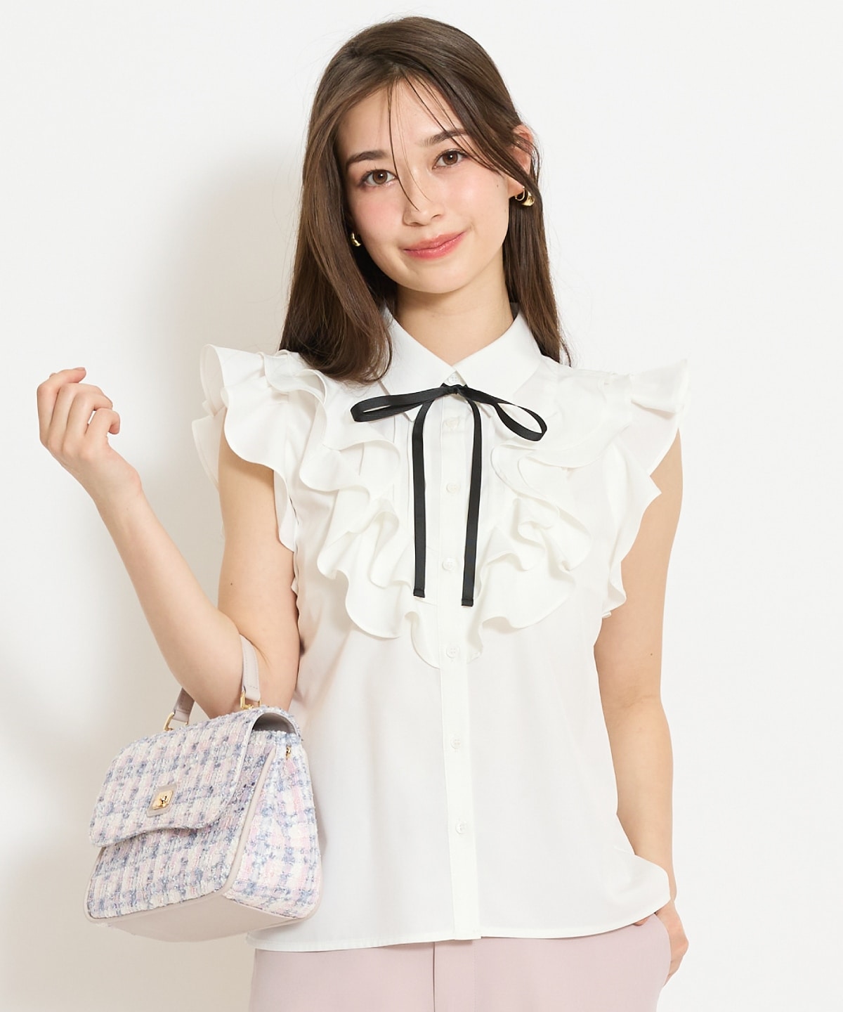 ラッフルフリルノースリーブブラウス